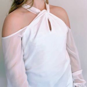 Off the shoulder shirt.